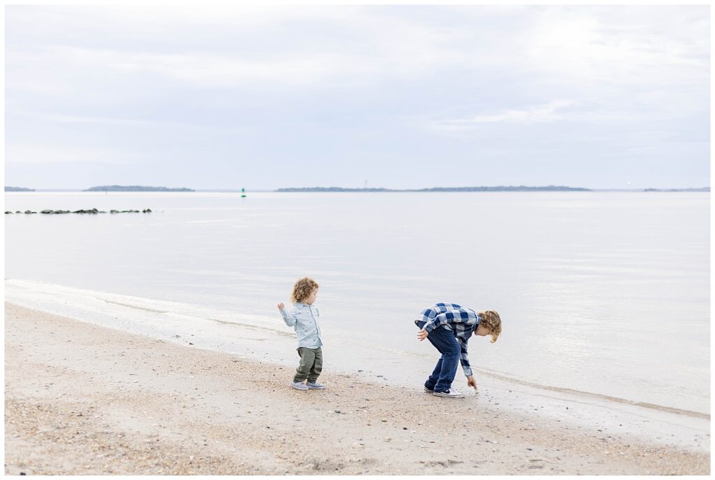Fort Clinch State Park Family Photography Young siblings exploring the beach during a coastal family photo session