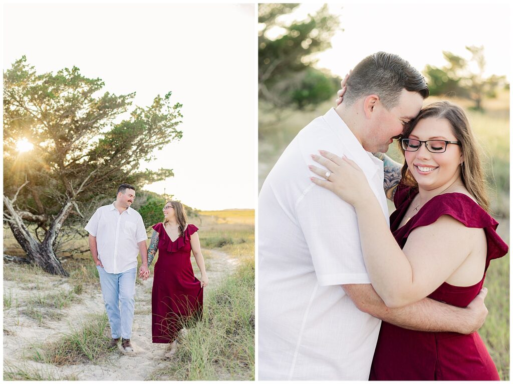 Engaged couple walking hand in hand along a sandy path surrounded by coastal trees during golden hour at Fort Clinch State Park 