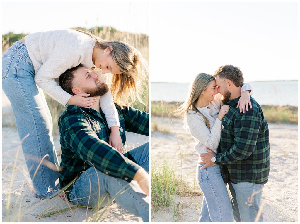 Fort Clinch engagement photos of the couple embracing in golden sunset light near tall sea oats and sandy shoreline.